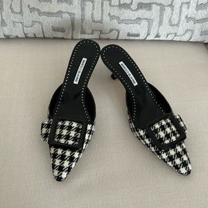 Make her happy this Christmas with brand new Manolo’s shoes.